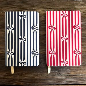 Draper James hardcover notebooks.